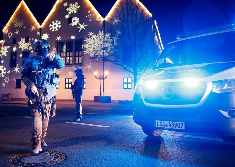 Driver kills at least two after ramming into crowd at German Christmas market By Reuters