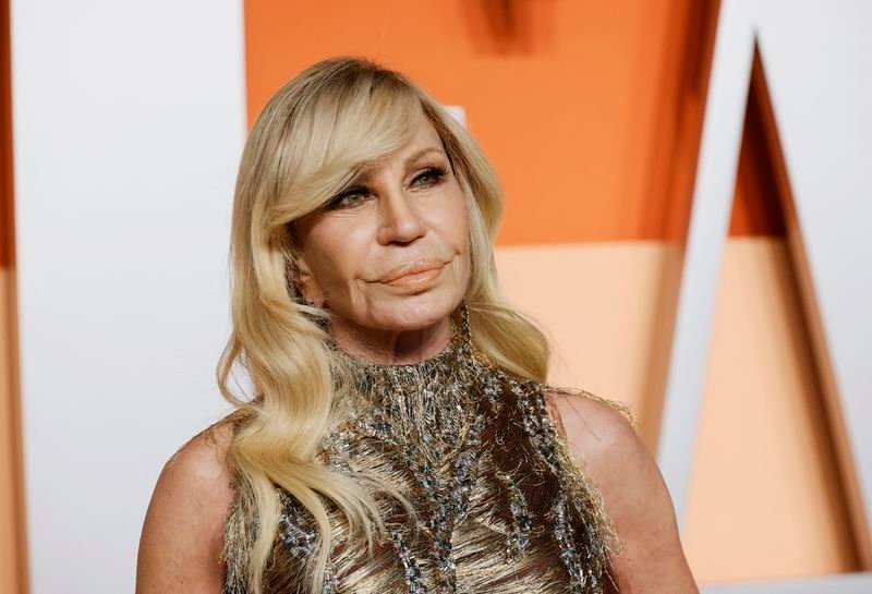 Donatella Versace steps down as design chief as Prada circles